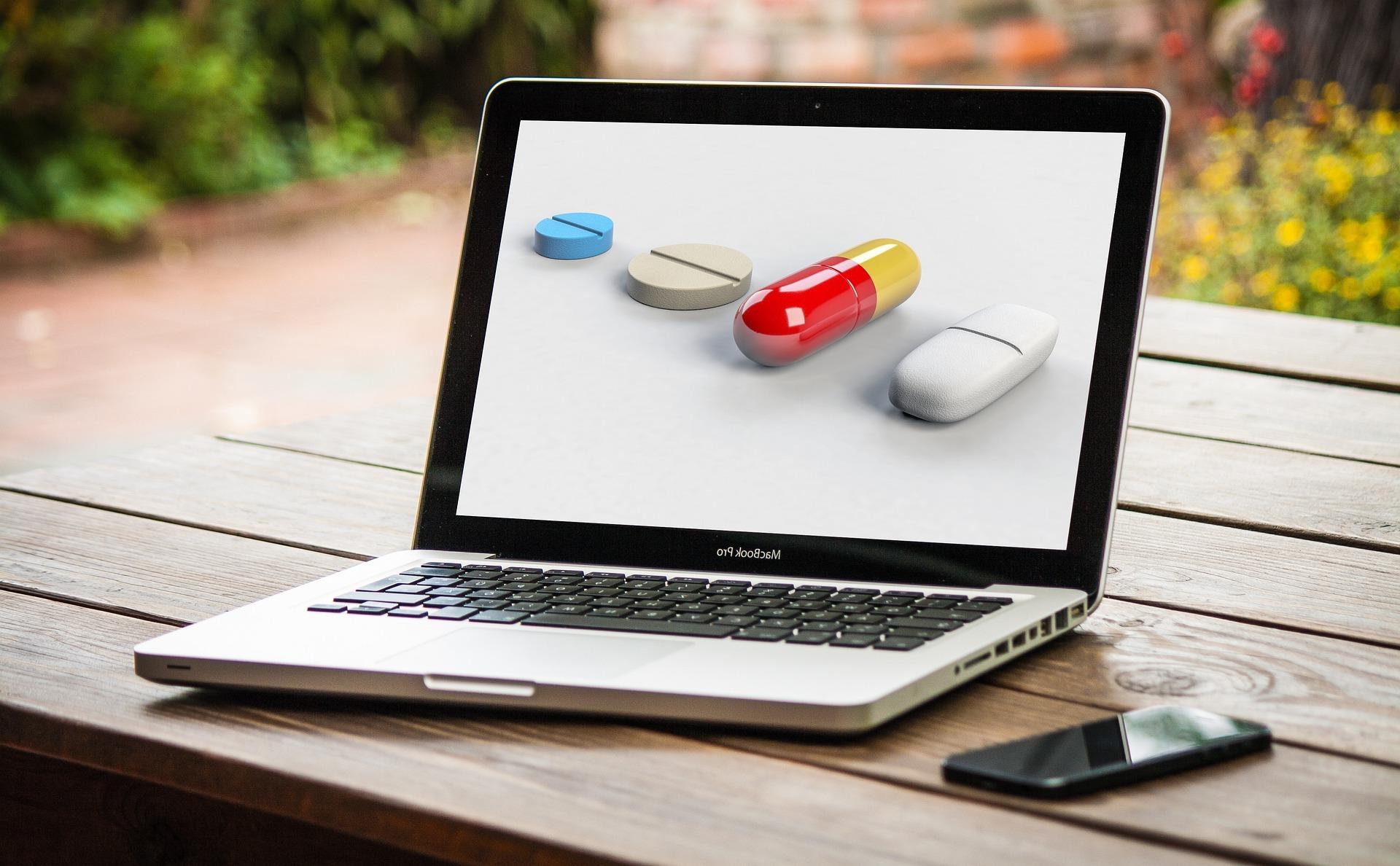 A laptop screen displaying a variety of different pills